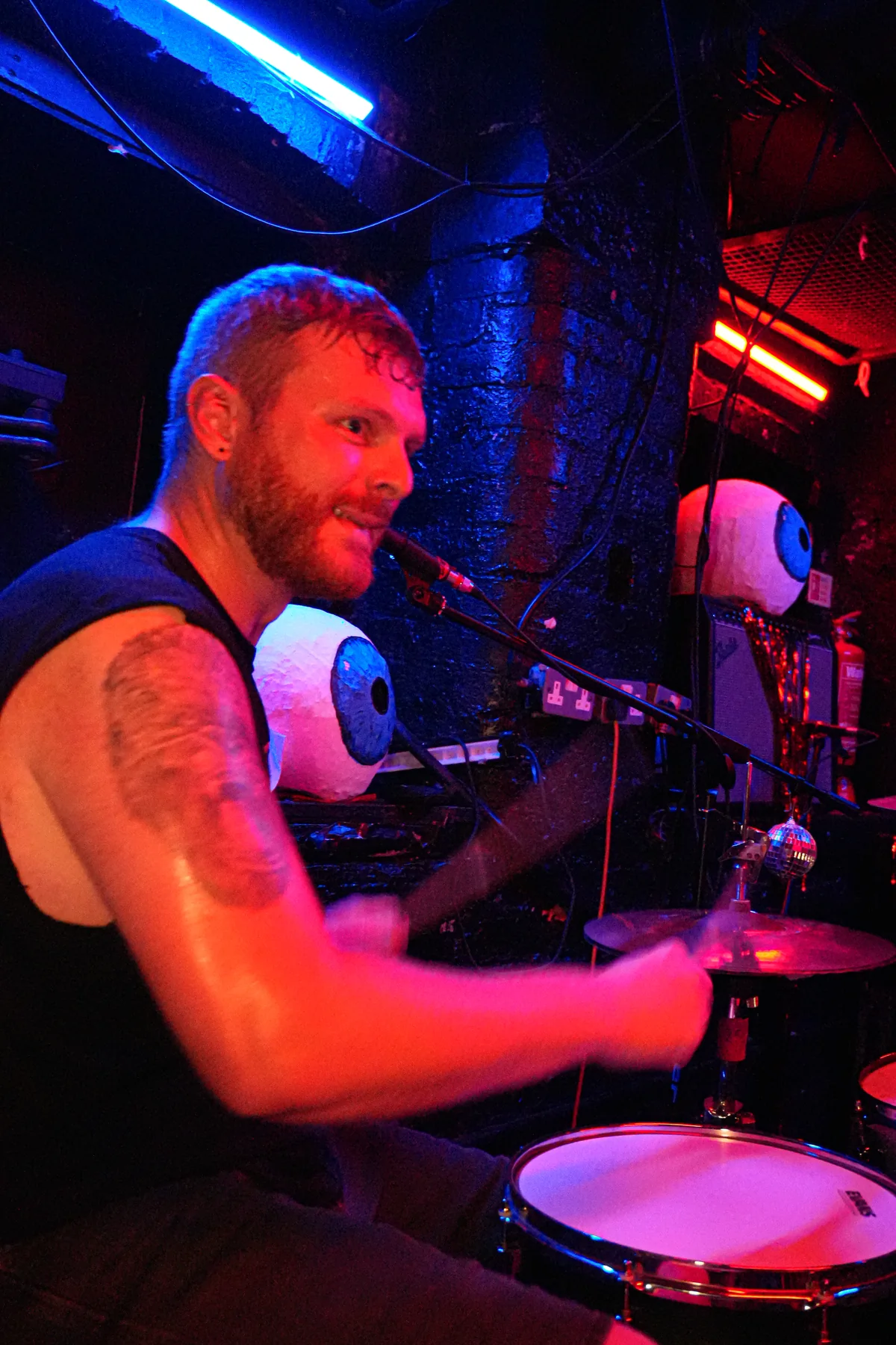Farris playing drums live at Stage and Radio
